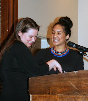 Director of Student Activities Erin Paschal presents Shekira Ramdass with the 