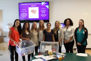 Two OT student groups with their Executive Function Performance Test kits that will be shared with two separate local clinics. Photo credit: Alison Grossenbaugh. 