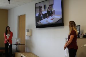 OT students show a video they created for their assigned clinic demonstrating administration of the Weekly Calendar Planning Activity.